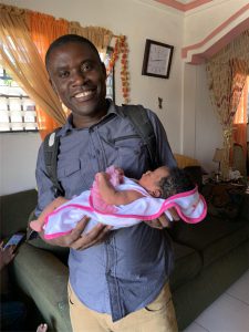 Dr. Lawrence with his new daughter